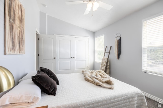 3421 E Dundee Dr, Eagle Mountain, UT 84005 - carpeted bedroom with vaulted ceiling, a closet, baseboards, and a ceiling fan