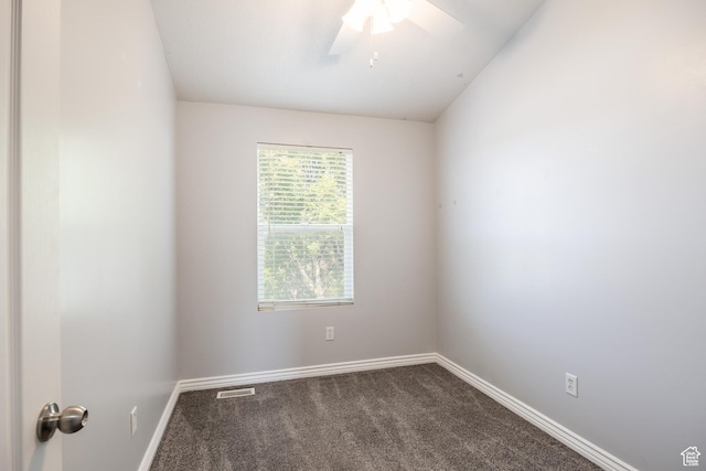 3421 E Dundee Dr, Eagle Mountain, UT 84005 - spare room featuring dark carpet, baseboards, and a ceiling fan