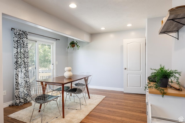 3421 E Dundee Dr, Eagle Mountain, UT 84005 - dining space with baseboards, light wood finished floors, and recessed lighting