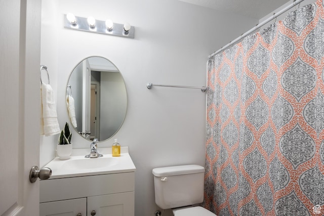 3421 E Dundee Dr, Eagle Mountain, UT 84005 - bathroom with vanity, toilet, and a shower with shower curtain