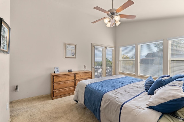 14163 S Friendship Dr W, Herriman, UT 84065 - bedroom featuring access to outside, light carpet, multiple windows, baseboards, and high vaulted ceiling