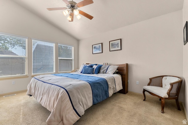 14163 S Friendship Dr W, Herriman, UT 84065 - bedroom featuring light carpet, multiple windows, vaulted ceiling, baseboards, and ceiling fan