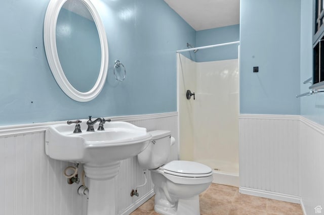 14163 S Friendship Dr W, Herriman, UT 84065 - full bathroom with wainscoting, a stall shower, toilet, and tile patterned flooring