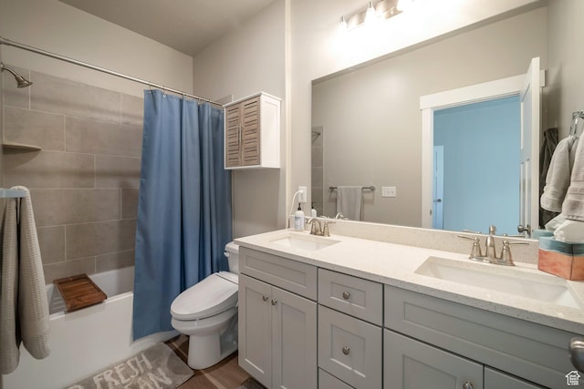 898 S 2560 E, Spanish Fork, UT 84660 - bathroom featuring toilet, double vanity, and shower / bath combo with shower curtain