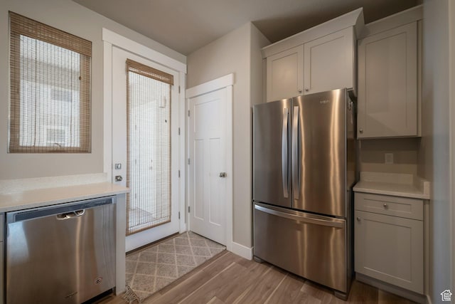 898 S 2560 E, Spanish Fork, UT 84660 - kitchen with appliances with stainless steel finishes, light countertops, wood finished floors, baseboards, and gray cabinets