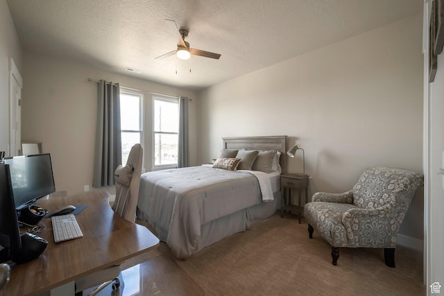 898 S 2560 E, Spanish Fork, UT 84660 - bedroom with an office area, ceiling fan, a textured ceiling, and light colored carpet