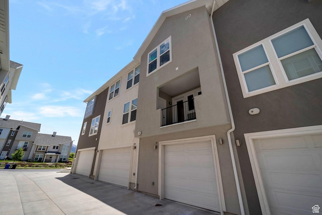898 S 2560 E, Spanish Fork, UT 84660 - back of house featuring stucco siding and a garage