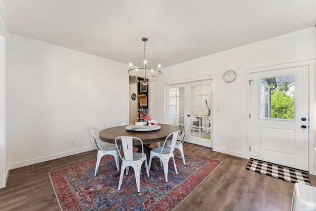 222 S Summer Breeze Ln, Layton, UT 84041 - dining area with a chandelier, dark wood finished floors, healthy amount of natural light, and baseboards