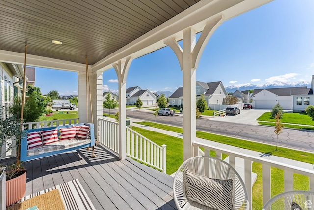 222 S Summer Breeze Ln, Layton, UT 84041 - porch featuring a residential view and a lawn