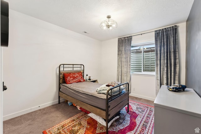 222 S Summer Breeze Ln, Layton, UT 84041 - carpeted bedroom with baseboards and a textured ceiling