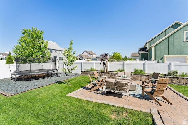 222 S Summer Breeze Ln, Layton, UT 84041 - view of yard featuring a trampoline and a patio