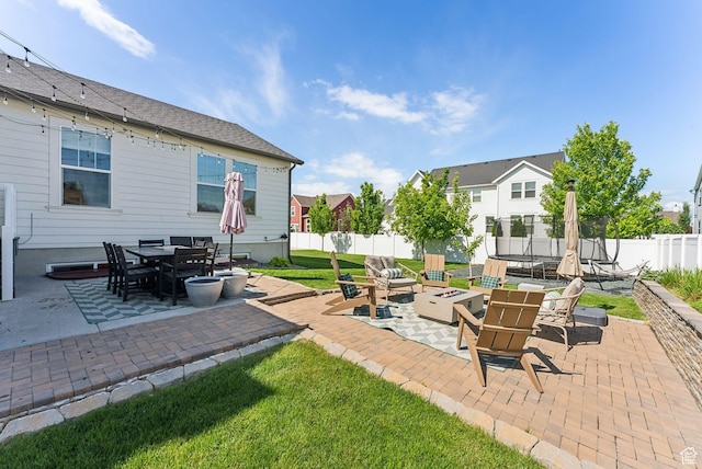 222 S Summer Breeze Ln, Layton, UT 84041 - view of patio with an outdoor fire pit, a trampoline, and outdoor dining area