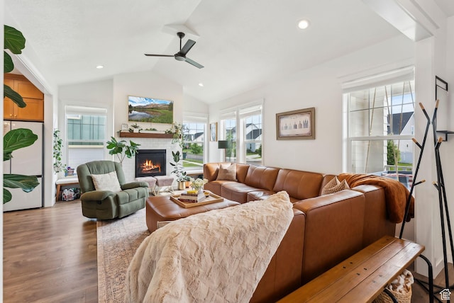 222 S Summer Breeze Ln, Layton, UT 84041 - living room with a glass covered fireplace, wood finished floors, vaulted ceiling, a ceiling fan, and recessed lighting