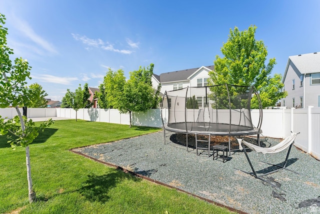 222 S Summer Breeze Ln, Layton, UT 84041 - view of yard with a trampoline and a residential view
