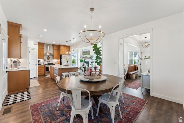 222 S Summer Breeze Ln, Layton, UT 84041 - dining space featuring a chandelier, plenty of natural light, recessed lighting, and dark wood-style flooring