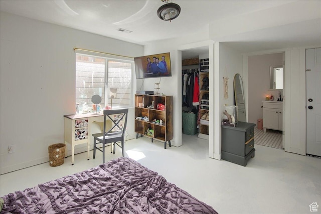 958 W Regatta Ln, Stansbury Park, UT 84074 - bedroom featuring a closet, a spacious closet, and ensuite bathroom