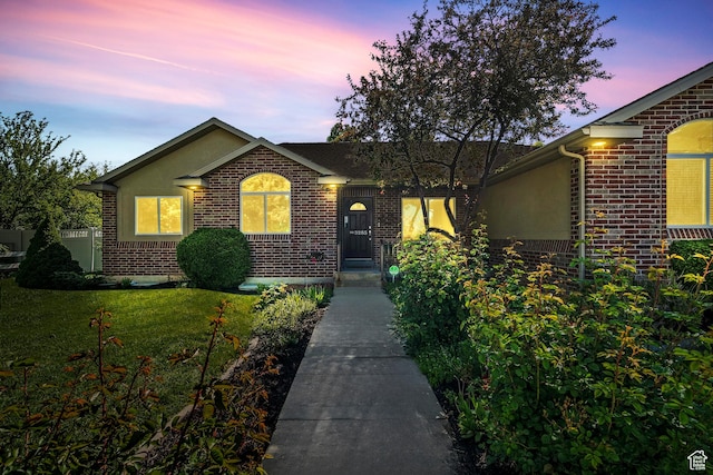 3285 S 575 W, Syracuse, UT 84075 - ranch-style house featuring brick siding, a front lawn, and stucco siding