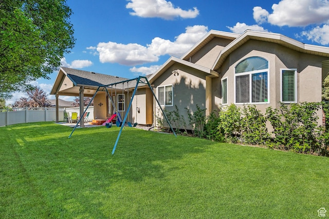 3285 S 575 W, Syracuse, UT 84075 - view of front of house with stucco siding and a patio