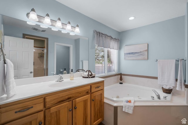 3285 S 575 W, Syracuse, UT 84075 - bathroom featuring vanity, a whirlpool tub, and a shower