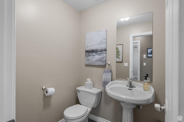 3285 S 575 W, Syracuse, UT 84075 - bathroom featuring toilet and baseboards