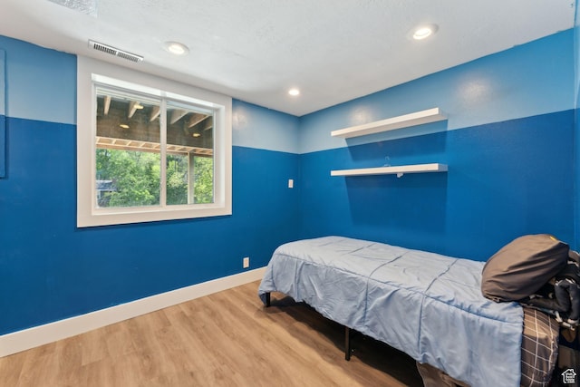 3407 S 325 W, Bountiful, UT 84010 - bedroom featuring wood finished floors, baseboards, and recessed lighting