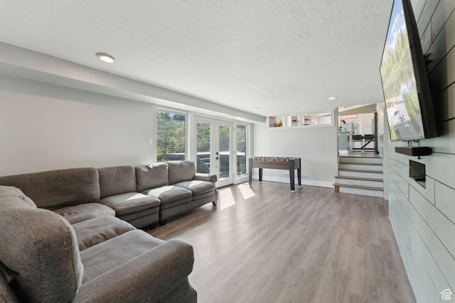 3407 S 325 W, Bountiful, UT 84010 - living room with wood finished floors, french doors, stairs, a textured ceiling, and recessed lighting