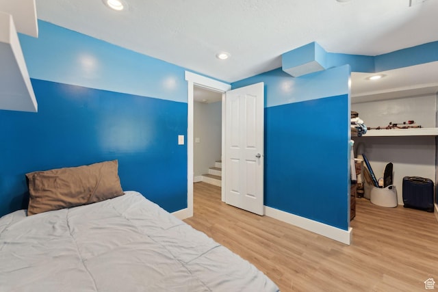 3407 S 325 W, Bountiful, UT 84010 - bedroom featuring wood finished floors, baseboards, and recessed lighting