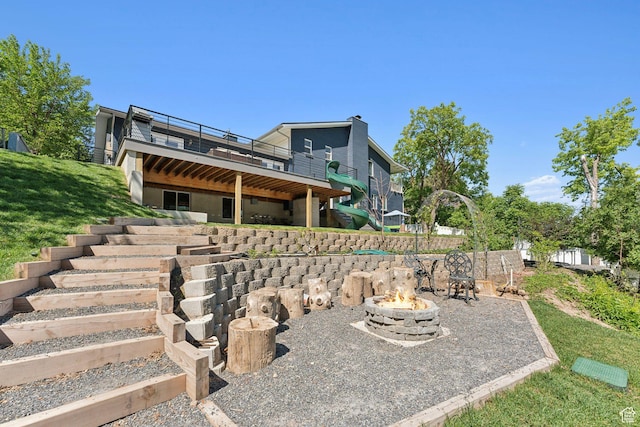 3407 S 325 W, Bountiful, UT 84010 - back of house featuring an outdoor fire pit, a deck, a yard, stairs, and a patio