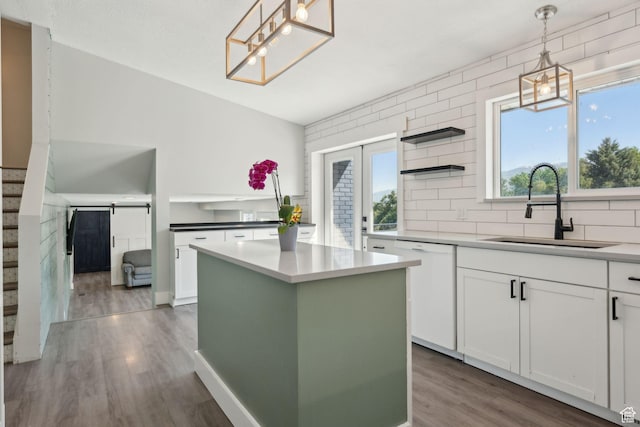 3407 S 325 W, Bountiful, UT 84010 - kitchen with a sink, dishwasher, wood finished floors, open shelves, and white cabinets