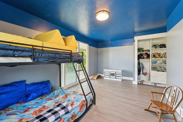 3407 S 325 W, Bountiful, UT 84010 - bedroom featuring wood finished floors and a closet