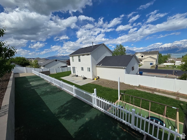 4043 S Lake Vista Dr, Saratoga Springs, UT 84045 - back of house featuring a residential view and a patio