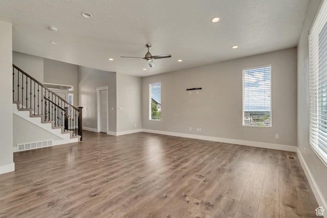 3727 N 900 W, Lehi, UT 84043 - unfurnished living room with wood finished floors, recessed lighting, a ceiling fan, stairway, and baseboards