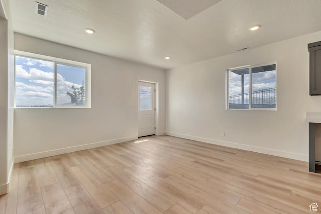 3727 N 900 W, Lehi, UT 84043 - unfurnished living room with light wood-style floors, baseboards, and recessed lighting