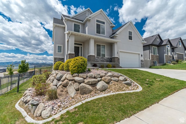 3727 N 900 W, Lehi, UT 84043 - craftsman house with stucco siding, stone siding, concrete driveway, an attached garage, and a residential view