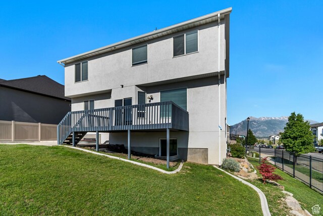 3727 N 900 W, Lehi, UT 84043 - back of house with a deck with mountain view, stucco siding, and stairway