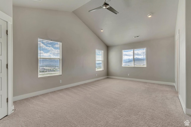 3727 N 900 W, Lehi, UT 84043 - spare room featuring vaulted ceiling, light carpet, a ceiling fan, and baseboards