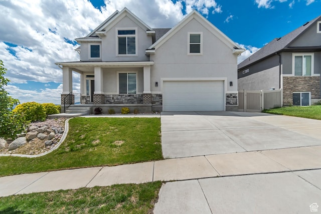 3727 N 900 W, Lehi, UT 84043 - view of front facade featuring an attached garage, stucco siding, a porch, and stone siding
