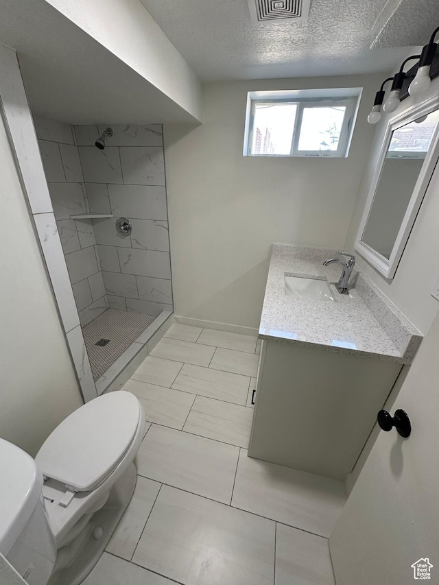 4688 S 200 E, Washington Terrace, UT 84405 - bathroom with toilet, vanity, a stall shower, and a textured ceiling