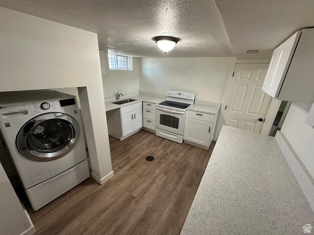 4688 S 200 E, Washington Terrace, UT 84405 - laundry area featuring washer / dryer, dark wood finished floors, a textured ceiling, and baseboards