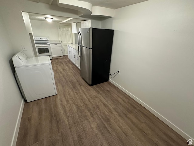 4688 S 200 E, Washington Terrace, UT 84405 - kitchen with white range with electric stovetop, freestanding refrigerator, washer / dryer, dark wood finished floors, and baseboards