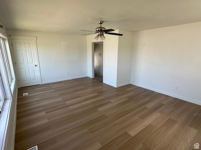4688 S 200 E, Washington Terrace, UT 84405 - empty room featuring wood finished floors, ceiling fan, and baseboards