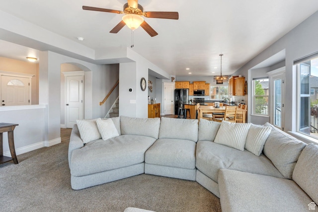 414 W Kit Fox Dr, Saratoga Springs, UT 84045 - living room featuring stairs, baseboards, ceiling fan, light colored carpet, and recessed lighting