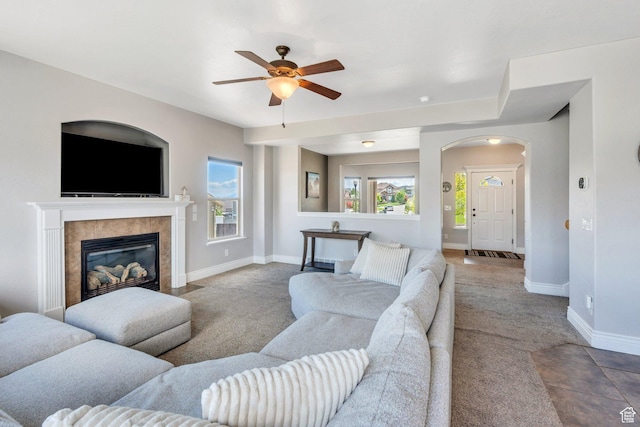 414 W Kit Fox Dr, Saratoga Springs, UT 84045 - living area featuring carpet floors, plenty of natural light, and a ceiling fan