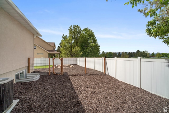 890 E 20 N, Smithfield, UT 84335 - fenced backyard featuring cooling unit