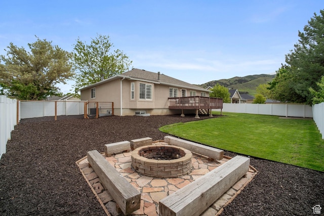 890 E 20 N, Smithfield, UT 84335 - view of yard with a fire pit and a deck with mountain view