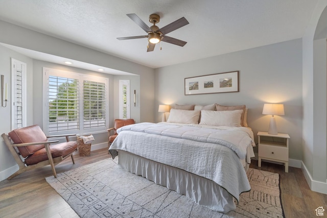 890 E 20 N, Smithfield, UT 84335 - bedroom with baseboards, wood finished floors, and ceiling fan