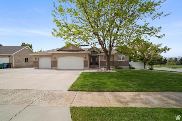 890 E 20 N, Smithfield, UT 84335 - ranch-style home with an attached garage, driveway, brick siding, a front lawn, and stucco siding