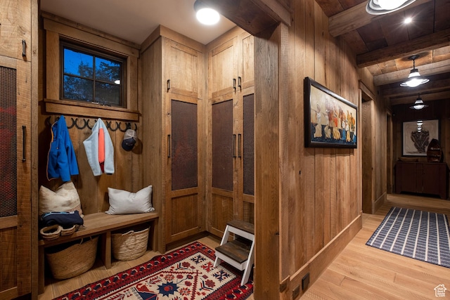 11042 E Wild Elk Mdw, Heber City, UT 84032 - mudroom with wood walls, light wood-style flooring, and beam ceiling