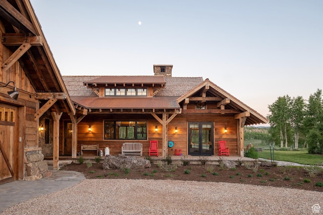 11042 E Wild Elk Mdw, Heber City, UT 84032 - log home with a chimney, a porch, and french doors