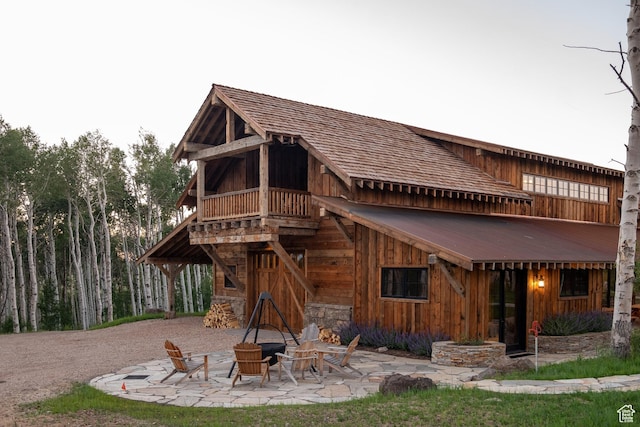 11042 E Wild Elk Mdw, Heber City, UT 84032 - rear view of house with a patio and a balcony